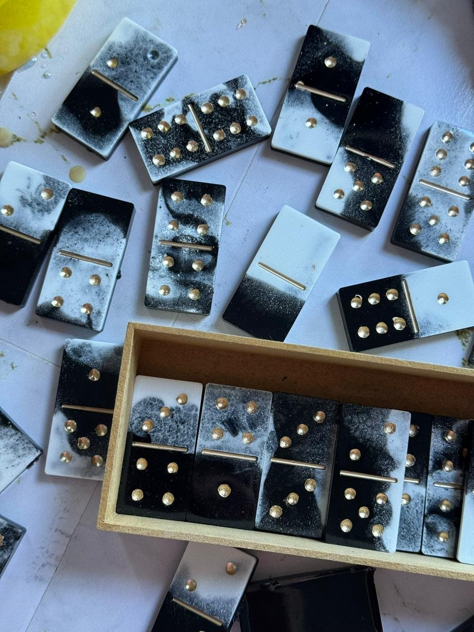 Close-up of pressed flowers in resin tray